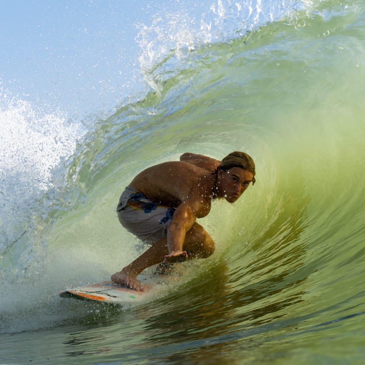 Gunner Snead surfing inside a wave